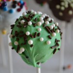 Green, brown, and white cake pops